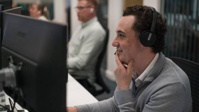 man looking at laptop