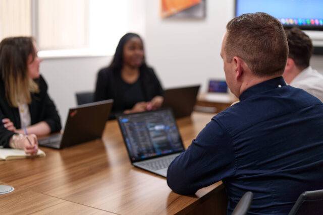 Arc team in meeting room