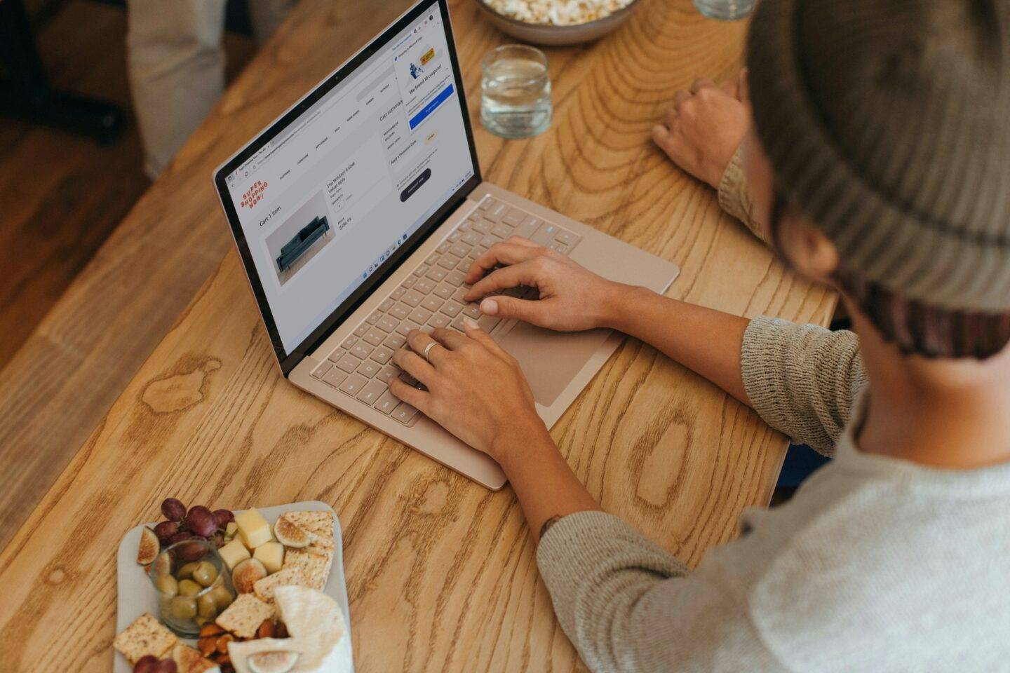 man sat at laptop