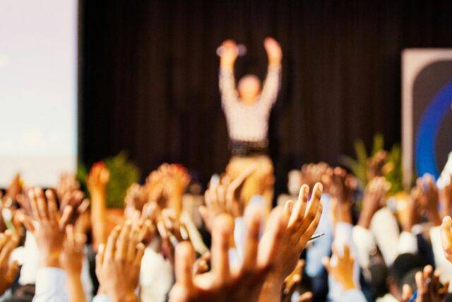 Audience with hands in the air