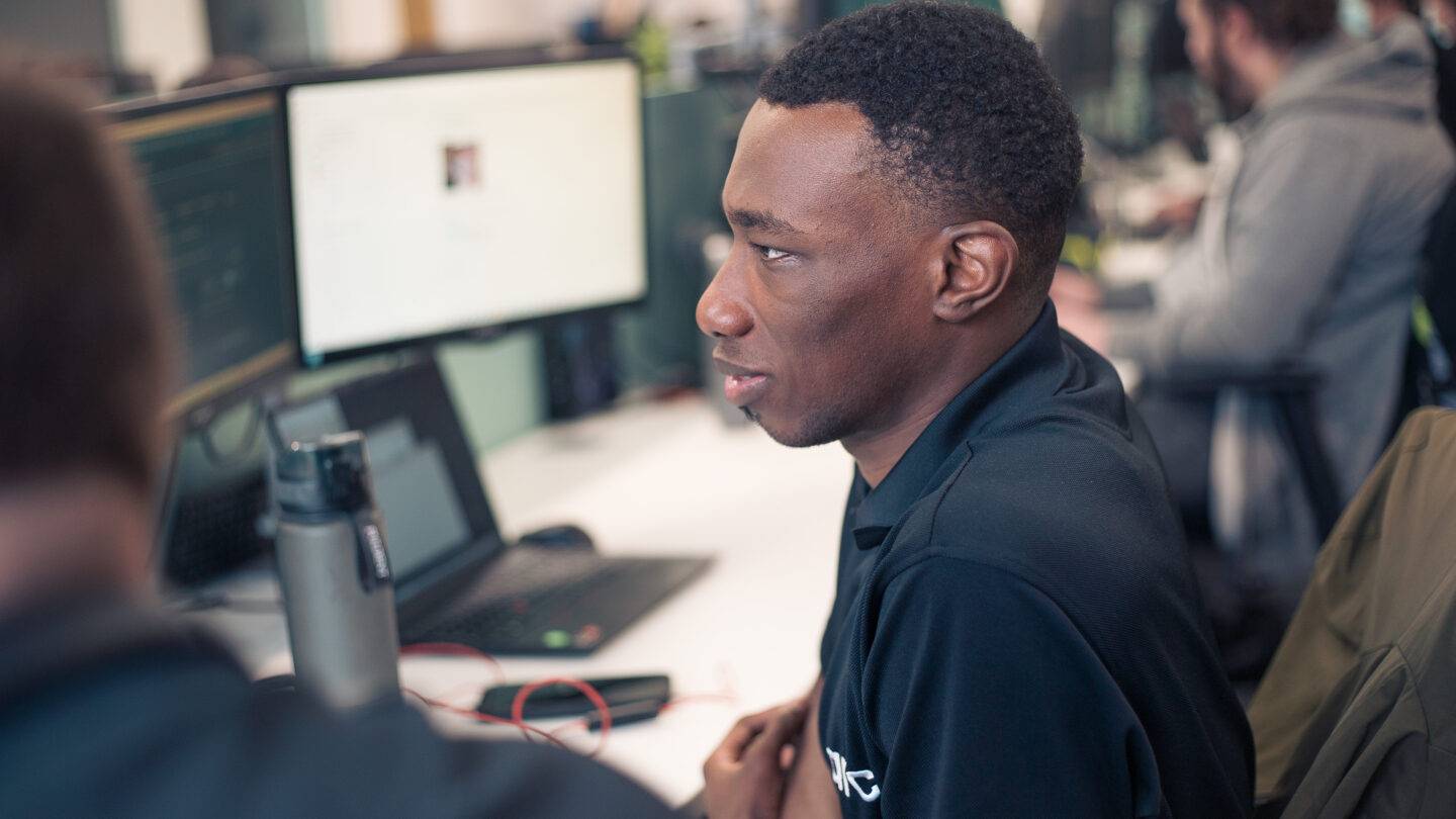 man sitting at a desk
